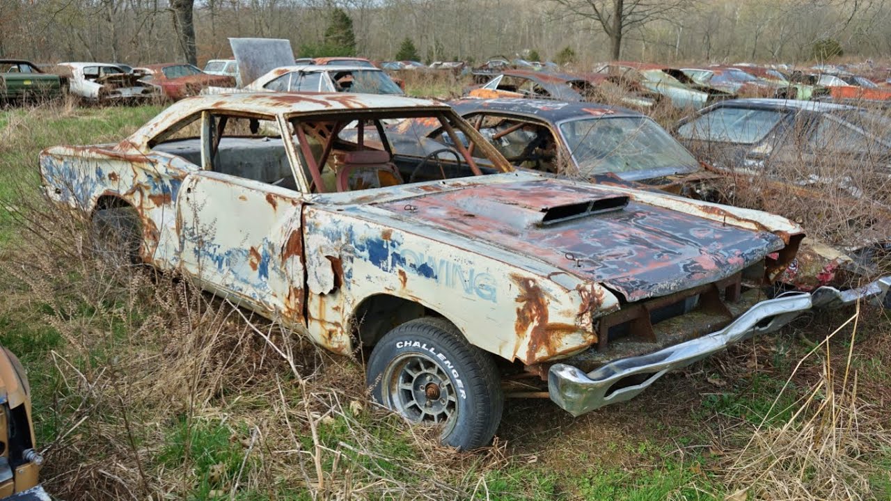 Junk car we buy — rusty wrecked vehicle